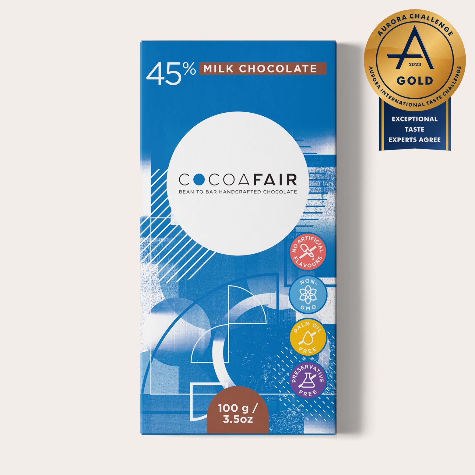 COCOAFAIR 100g 45% Milk Chocolate Packaging shot - Front view, Blue packaging on white background. Gold Aurora Challenge