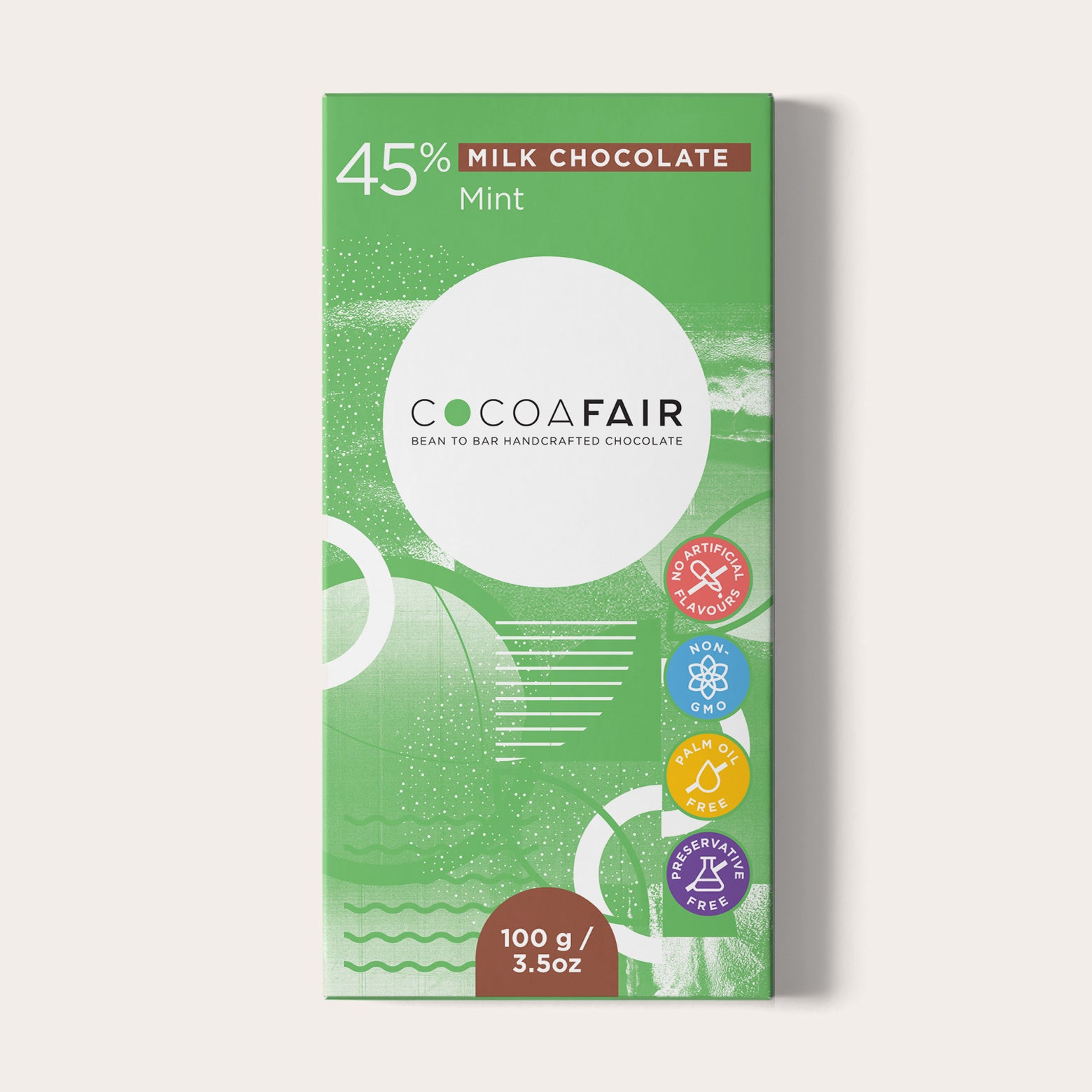 COCOAFAIR 100g 45% Milk Chocolate Packaging shot - Front view, Green packaging on white background. Mint flavoured chocolate