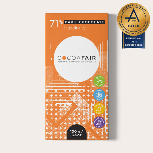 COCOAFAIR 100g 71% Dark Chocolate Packaging shot - Front view, Orange packaging on white background. Hazelnut flavoured chocolate. Award winning, gold in Aurora Challange